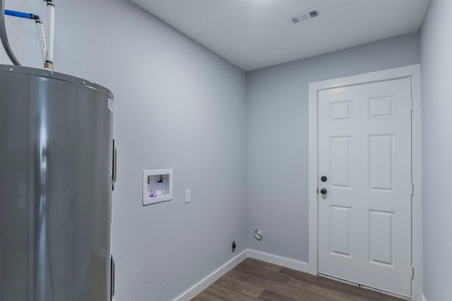 clothes washing area with electric dryer hookup, dark hardwood / wood-style floors, and washer hookup