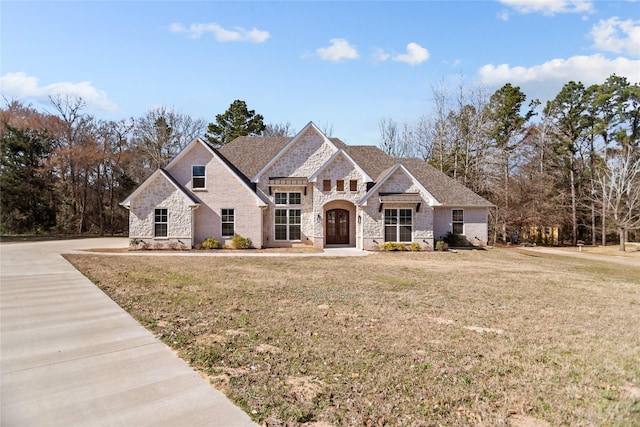 view of front of home with a front yard