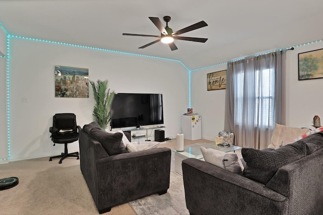 carpeted living room featuring ceiling fan