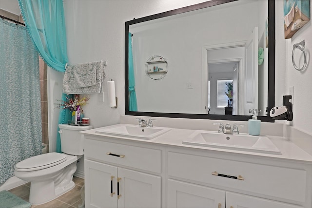 full bathroom featuring shower / tub combo with curtain, vanity, toilet, and tile patterned floors