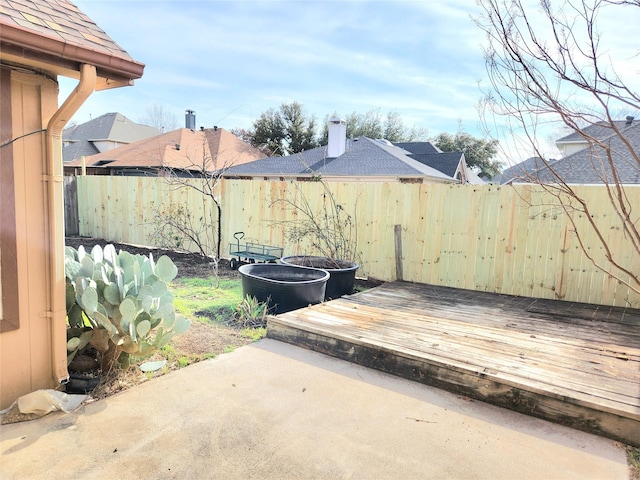 view of patio with a wooden deck