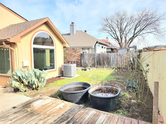 deck with cooling unit and a fire pit