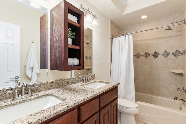 full bathroom featuring vanity, tile patterned flooring, toilet, and shower / bathtub combination with curtain