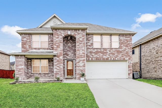 2312 Bantry Ln, Arlington, TX 76002 - view of front of house with an attached garage, concrete driveway, brick siding, roof with shingles, and central air condition unit