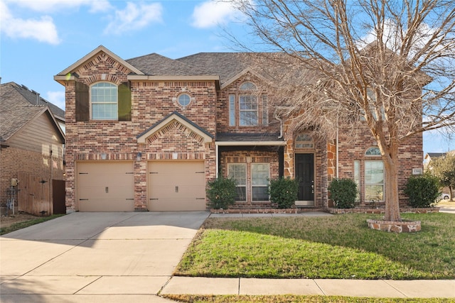 view of front facade featuring a garage and a front lawn