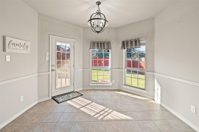 1300 Spanish Needle Trl, Fort Worth, TX 76177 - doorway with tile patterned floors, baseboards, and a chandelier