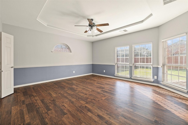 1300 Spanish Needle Trl, Fort Worth, TX 76177 - unfurnished room with wood-type flooring, baseboards, a raised ceiling, visible vents, and a ceiling fan
