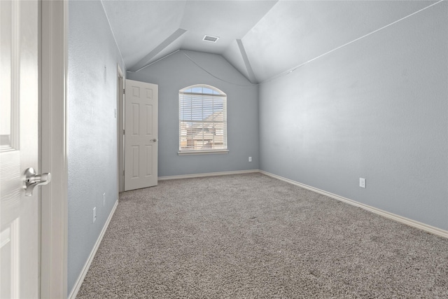 1300 Spanish Needle Trl, Fort Worth, TX 76177 - empty room featuring baseboards, lofted ceiling, visible vents, and carpet flooring
