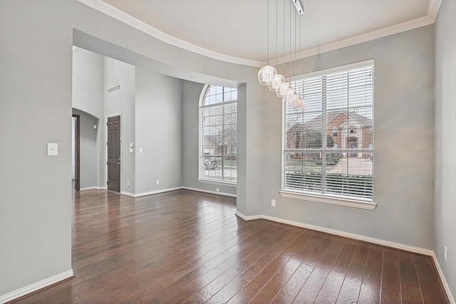 unfurnished room with dark wood-type flooring and ornamental molding