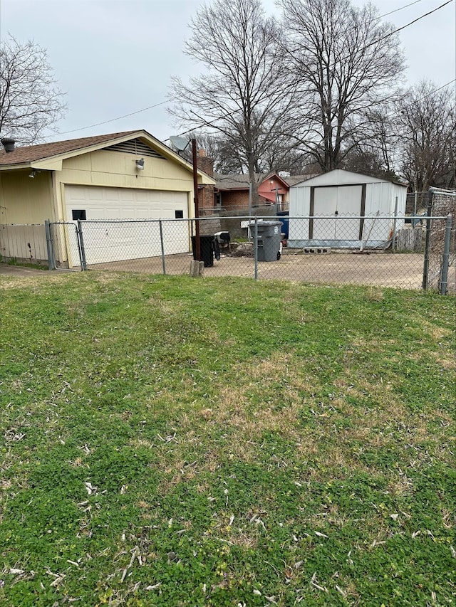 view of yard featuring a garage