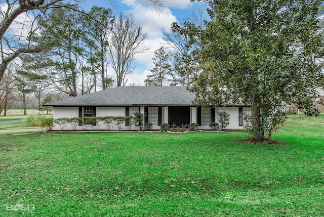 ranch-style house with a front yard