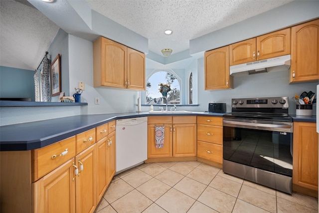 kitchen with sink, kitchen peninsula, white dishwasher, and stainless steel range with electric stovetop