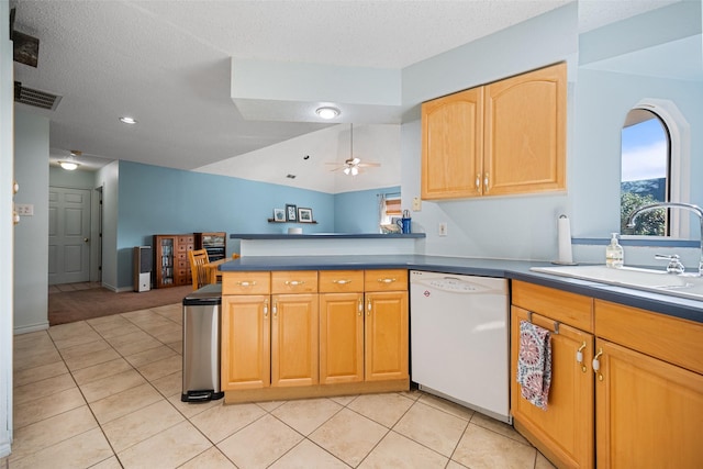 kitchen featuring ceiling fan, white dishwasher, kitchen peninsula, and sink