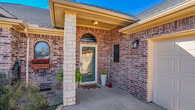 property entrance with a garage