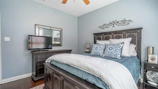 bedroom featuring ceiling fan and dark hardwood / wood-style flooring