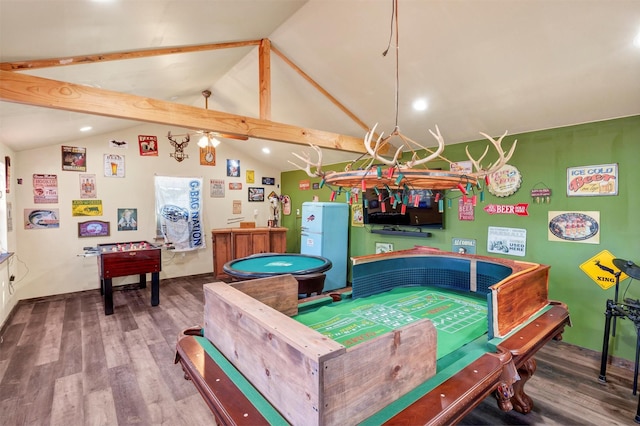 rec room featuring hardwood / wood-style flooring and vaulted ceiling with beams