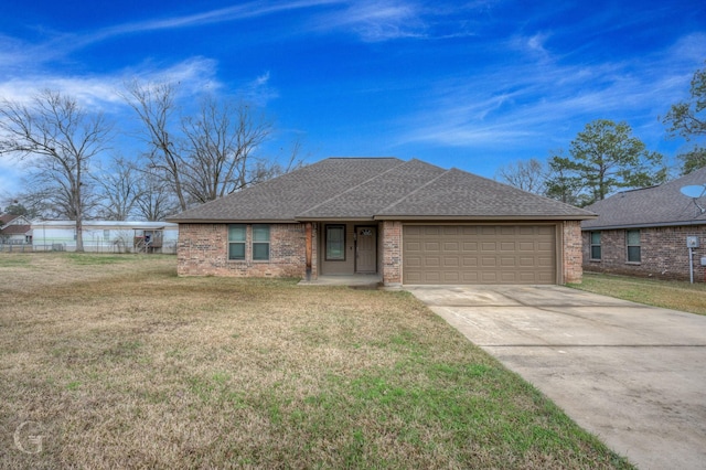 ranch-style house with a garage and a front yard