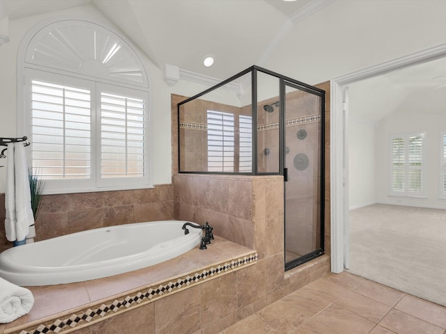 bathroom featuring tile patterned flooring, shower with separate bathtub, and ornamental molding