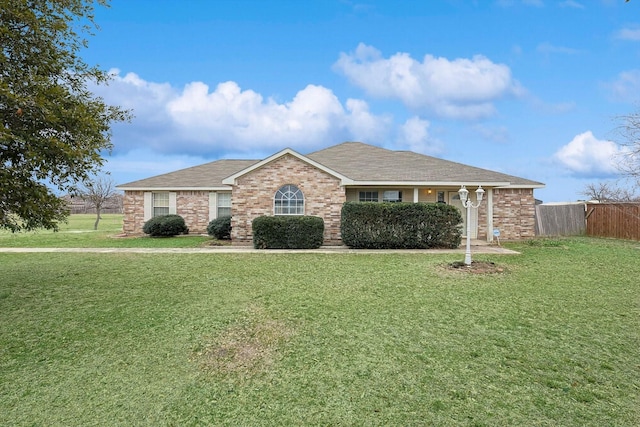 ranch-style house with a front yard