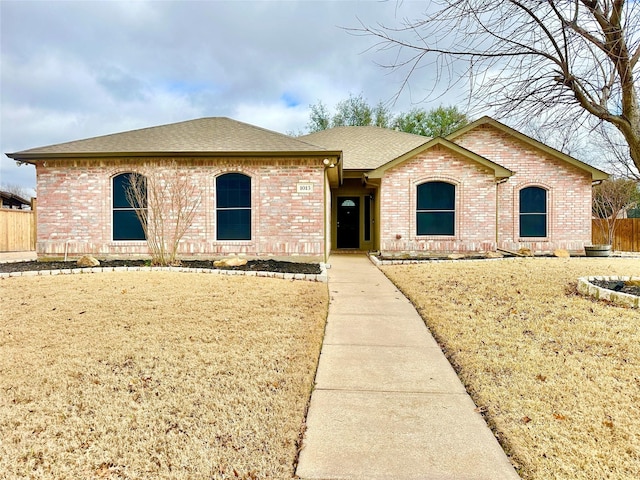 view of front of home with a front yard