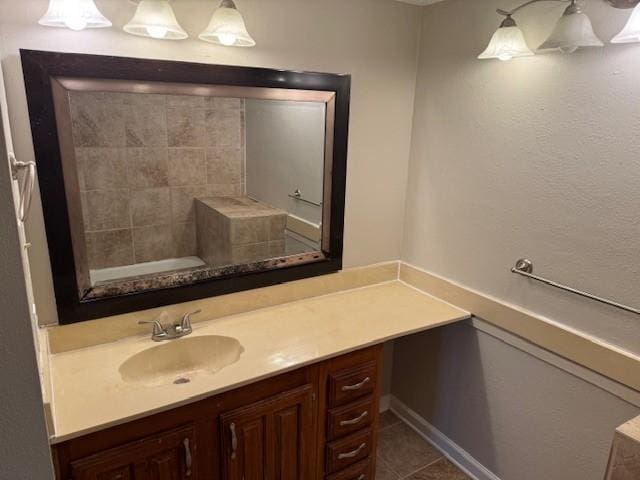 bathroom featuring tile patterned floors and vanity