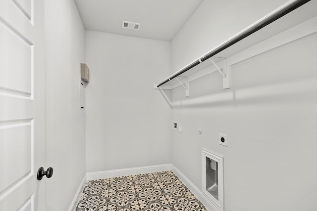 clothes washing area with electric dryer hookup, hookup for a washing machine, hookup for a gas dryer, and tile patterned floors