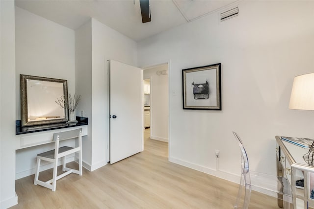 office with ceiling fan and light wood-type flooring