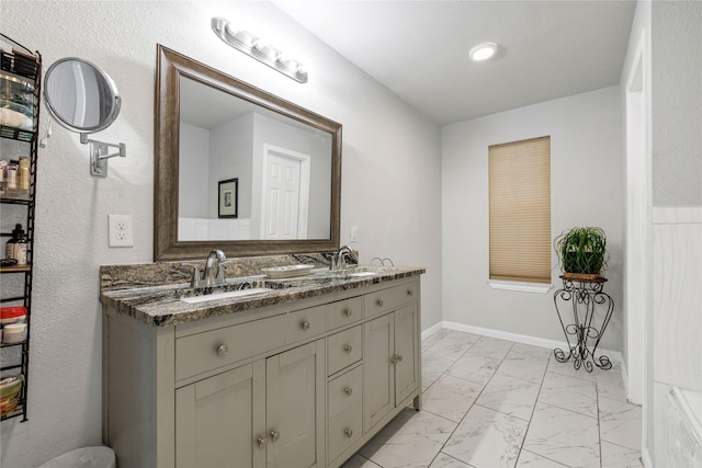 1435 Pioneer Ln, Lowry Crossing, TX 75069 - bathroom featuring marble look tiles and double vanity