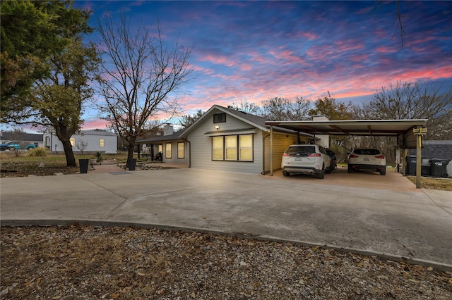 view of front of property with a carport