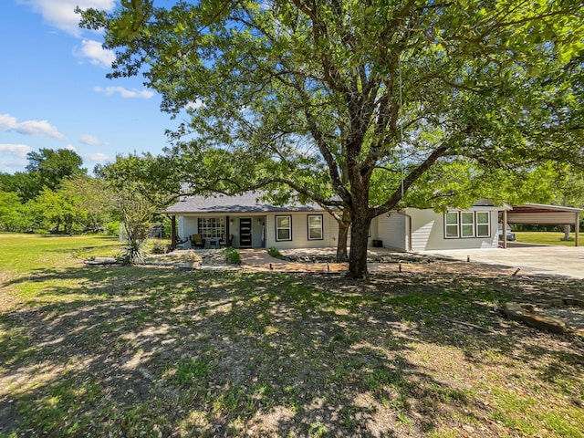 1435 Pioneer Ln, Lowry Crossing, TX 75069 - view of front of property featuring a carport, driveway, and covered porch