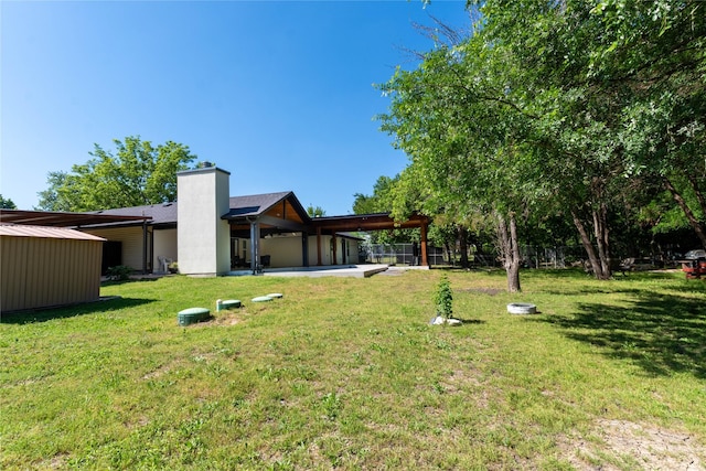 1435 Pioneer Ln, Lowry Crossing, TX 75069 - view of yard featuring a patio area, an attached garage, and an attached carport