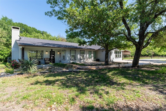 1435 Pioneer Ln, Lowry Crossing, TX 75069 - single story home with a chimney and a front yard
