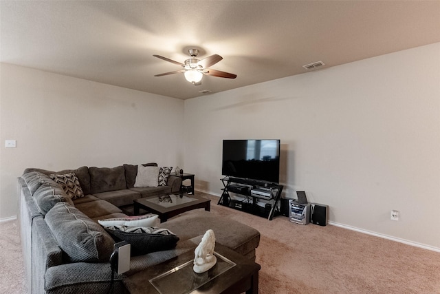 carpeted living room featuring ceiling fan