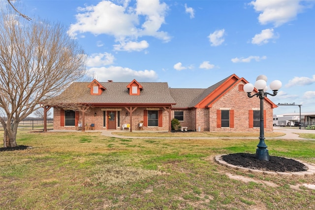 view of front of home featuring a front yard