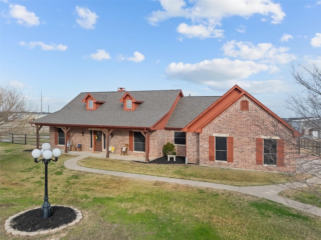 view of front facade with a front lawn