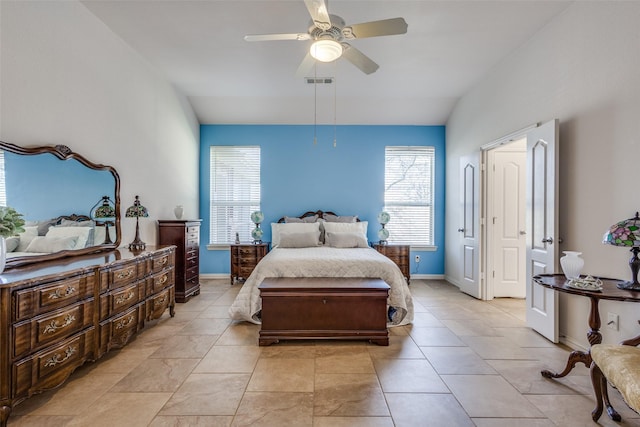 bedroom with ceiling fan and vaulted ceiling