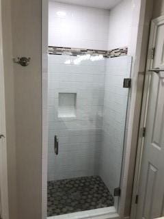 bathroom featuring walk in shower