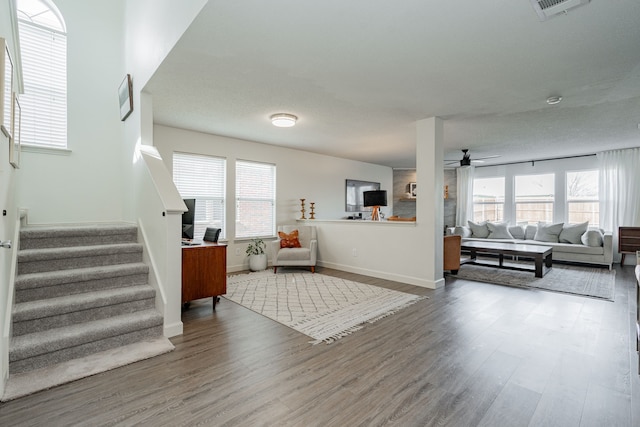 interior space featuring hardwood / wood-style flooring and ceiling fan