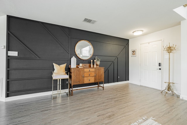 entrance foyer featuring hardwood / wood-style floors