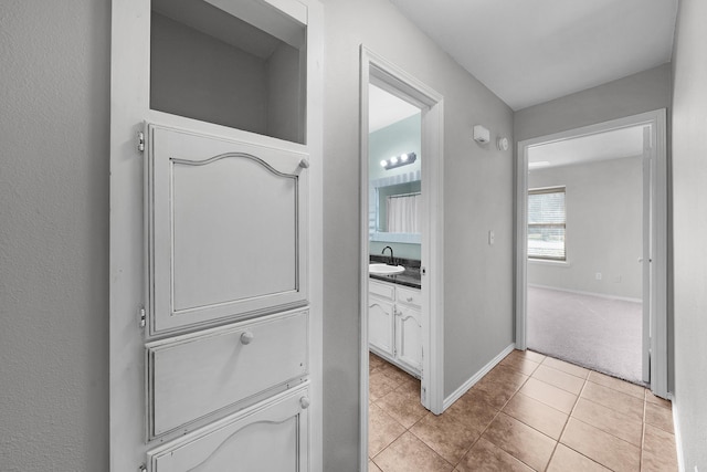 bathroom with vanity and tile patterned floors