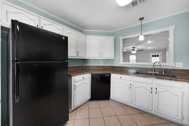 kitchen featuring white cabinetry, sink, light tile patterned flooring, and black appliances