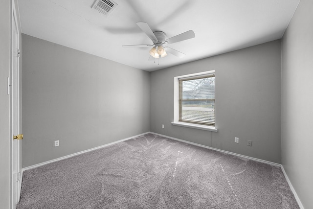 unfurnished room with carpet floors and ceiling fan