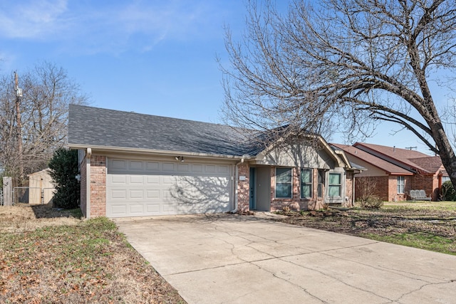 single story home featuring a garage