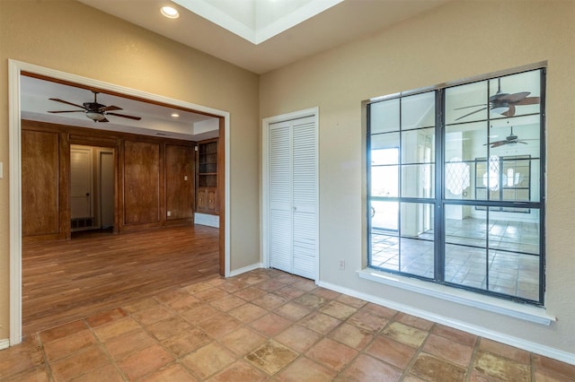 spare room with ceiling fan