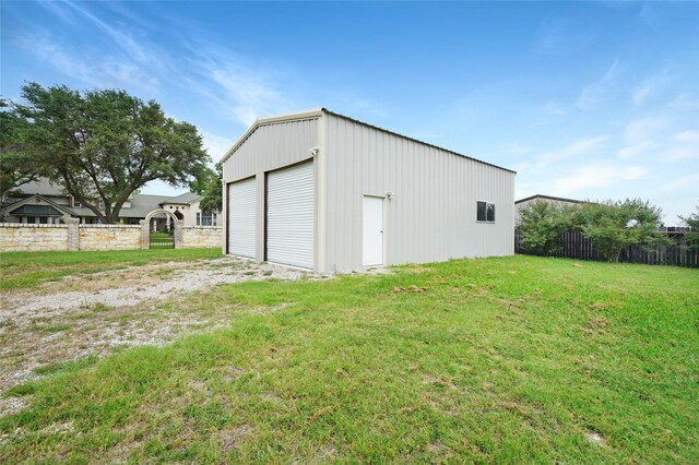 detached garage with fence