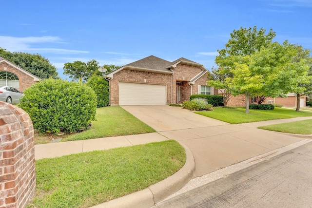 view of front facade with a garage and a front yard