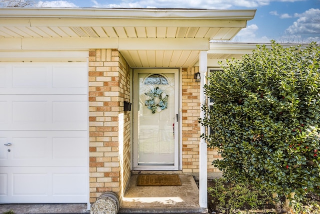 property entrance with a garage