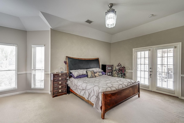 bedroom featuring visible vents, french doors, carpet, and access to outside