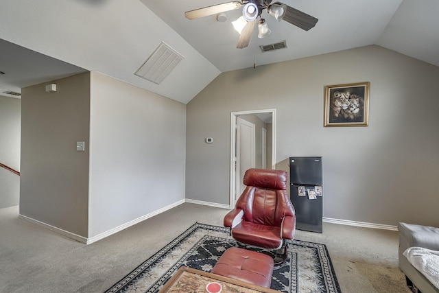 sitting room featuring visible vents, baseboards, a ceiling fan, and vaulted ceiling