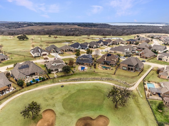 birds eye view of property with a residential view